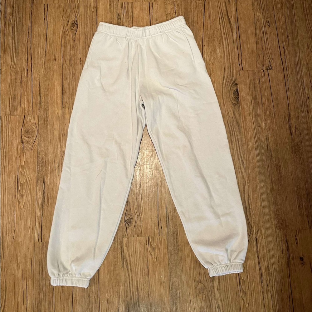 Cream Pacsun Land Rover sweatpants with drawstring waist
